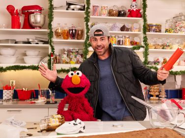 Mark Rober and Elmo.