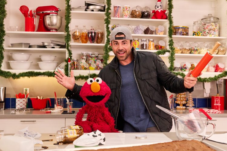 Mark Rober and Elmo.