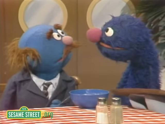 Grover and a customer