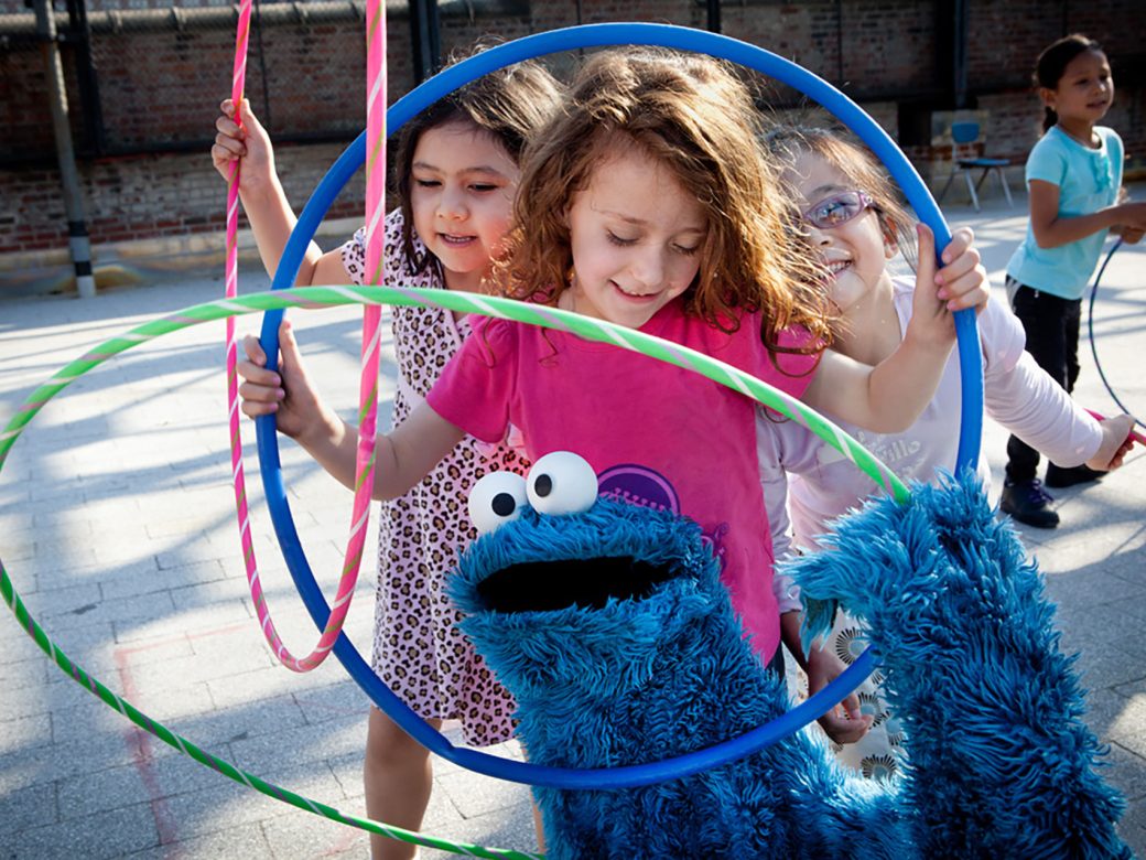 Cookie Monster and children in the park