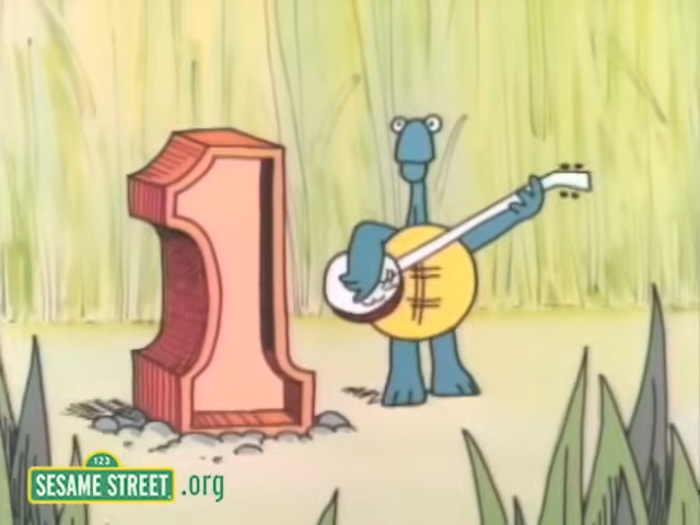 A Turtle with a guitar and standing next to number 1