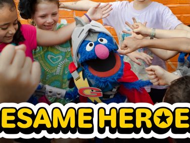 Super Grover surrounded by kids final
